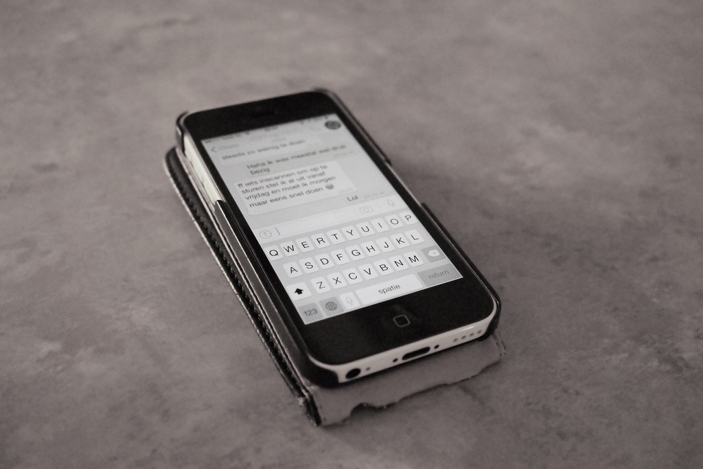 Smartphone used to send a message with vehicle photos